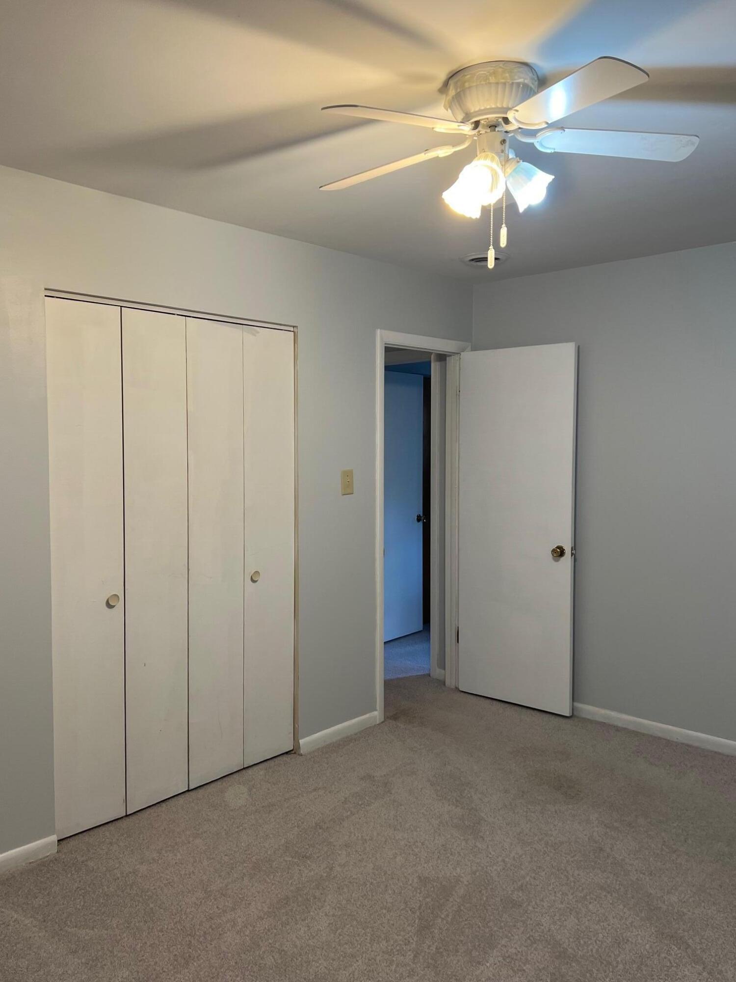 655 Gene Lane Valparaiso, IN 46385 - Photo 18 of 21 an empty room with a chandelier fan