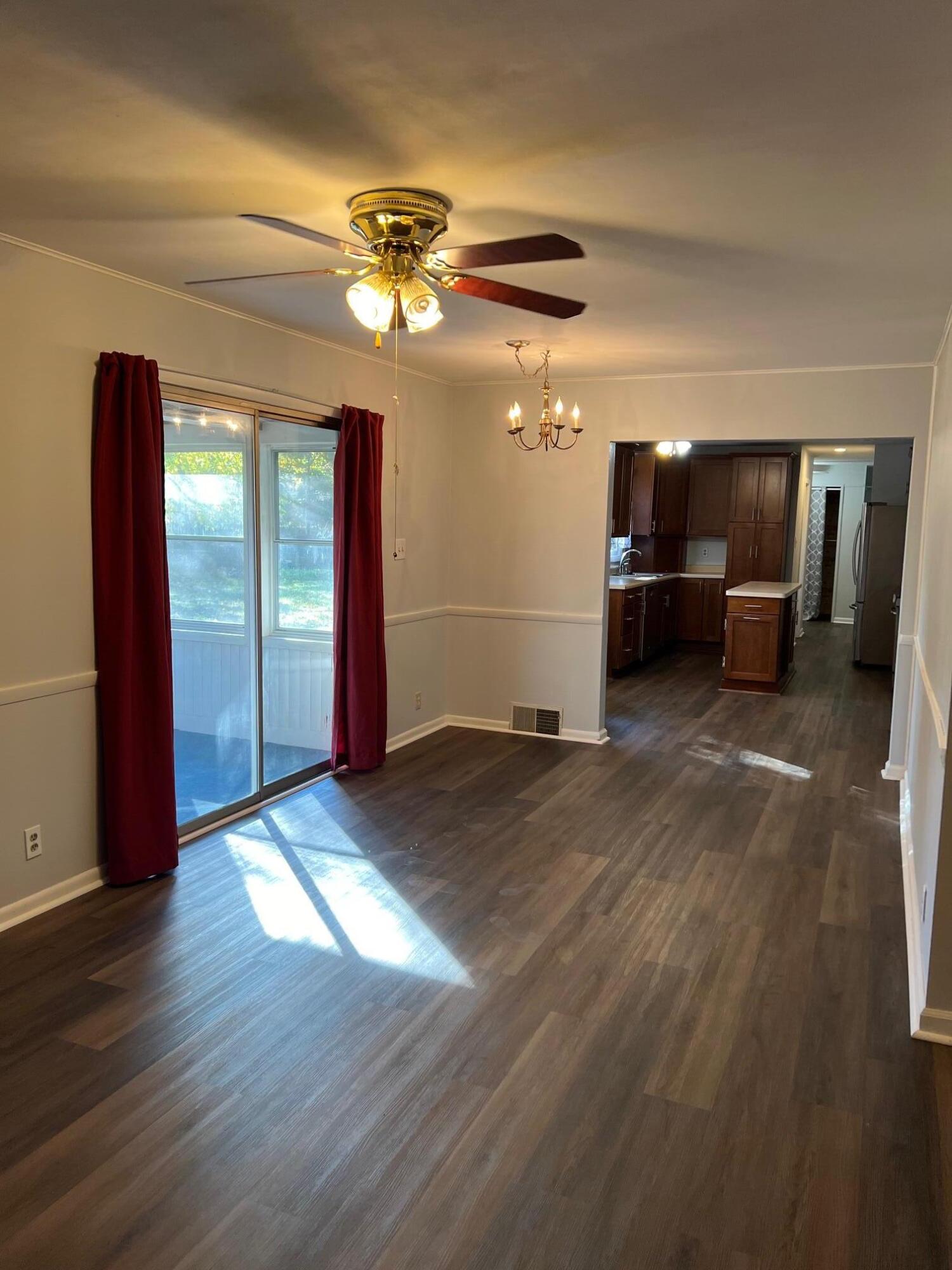 655 Gene Lane Valparaiso, IN 46385 - Photo 7 of 21 a view of a livingroom with furniture wooden floor and window