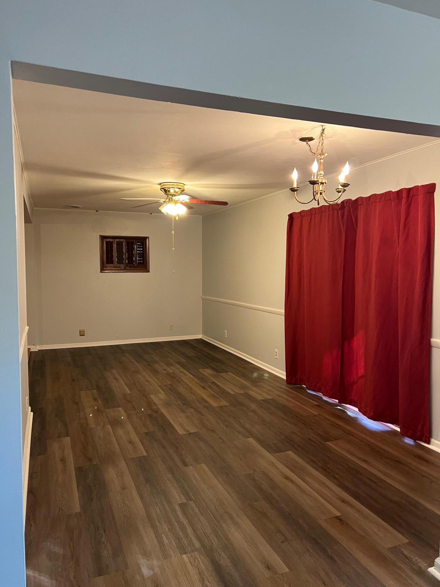 655 Gene Lane Valparaiso, IN 46385 - Photo 8 of 21 a view of a livingroom with wooden floor