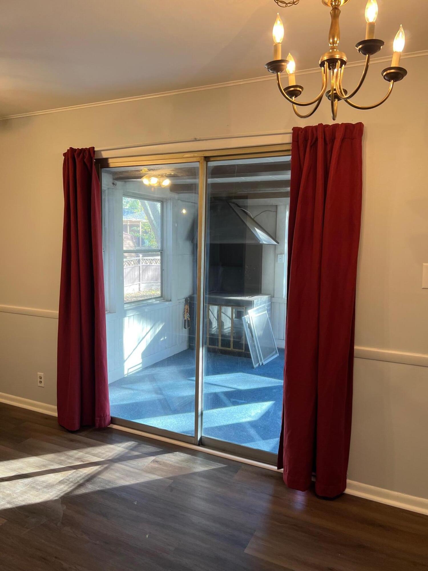 655 Gene Lane Valparaiso, IN 46385 - Photo 10 of 21 a view of a hallway with wooden floor and front door