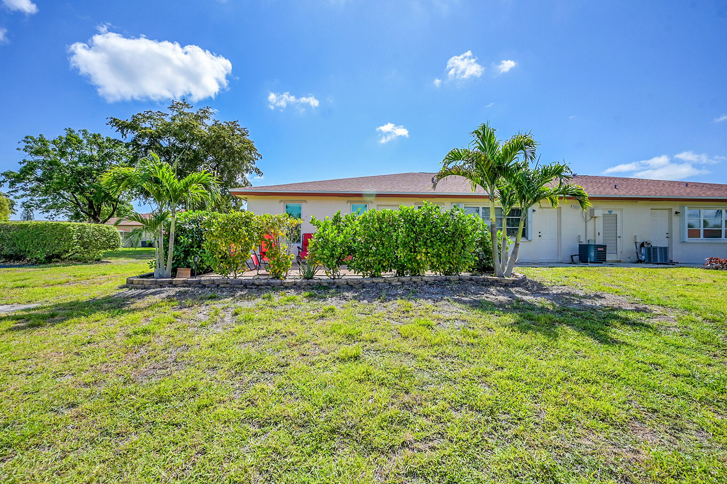 4585 Northwest 3rd Street, Unit D Delray Beach, FL 33445 - Photo 35 of 45 Landscaped for Privacy