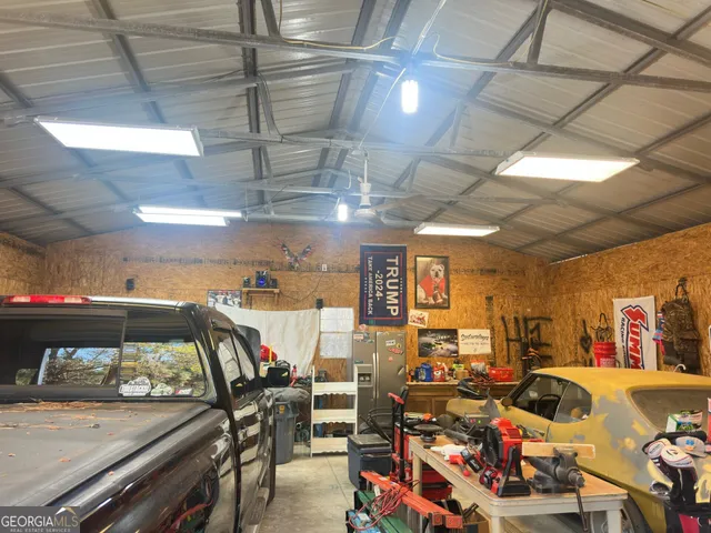 a view of a gym with wooden floor