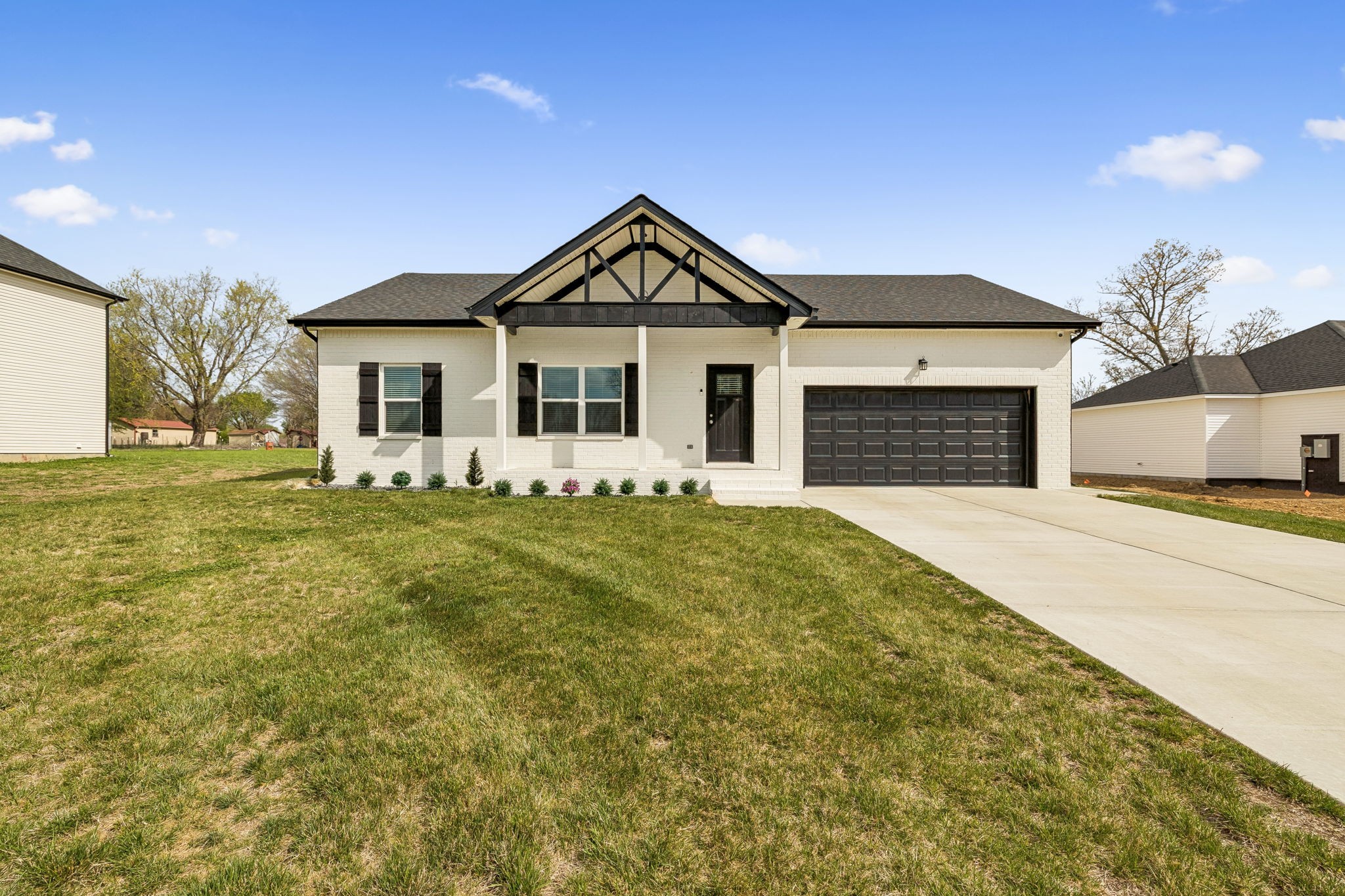 180 Vickers Hill Road Smithville, TN 37166 - Photo 2 of 33 a front view of a house with a yard