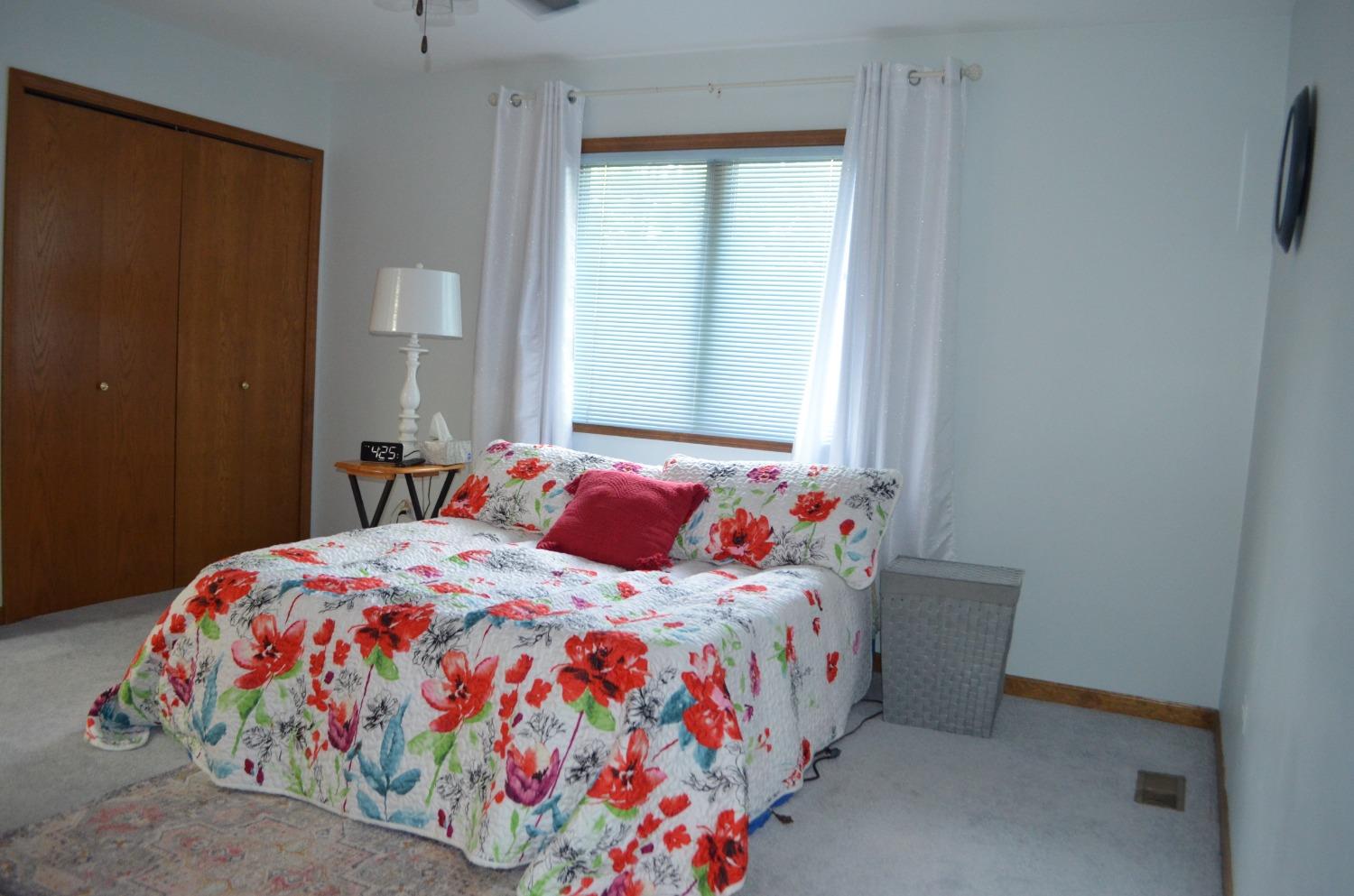 2330 Boulder Road Dyer, IN 46311 - Photo 15 of 24 a bedroom with a bed and a window