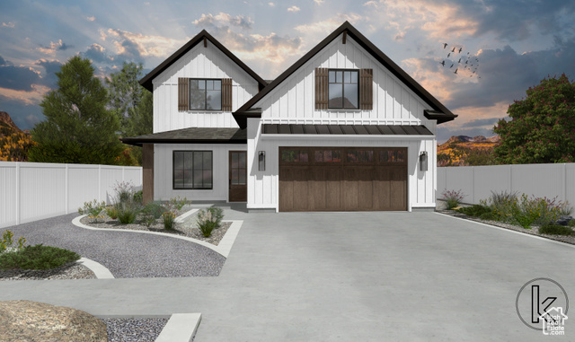 View of front of home with board and batten siding, driveway, a standing seam roof, a garage, and a metal roof
