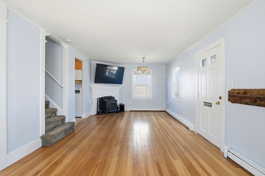 7 Mildred Street Hull, MA 02045 - Photo 19 of 42 a view of a livingroom with a fireplace