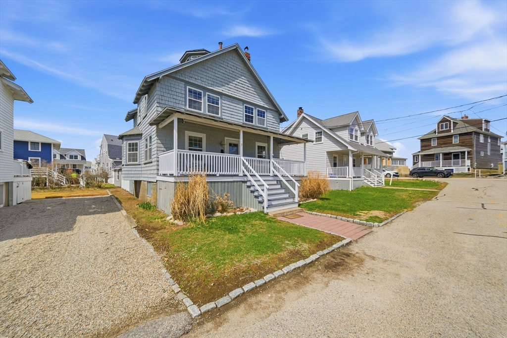 7 Mildred Street Hull, MA 02045 - Photo 30 of 42 a front view of a house with a yard
