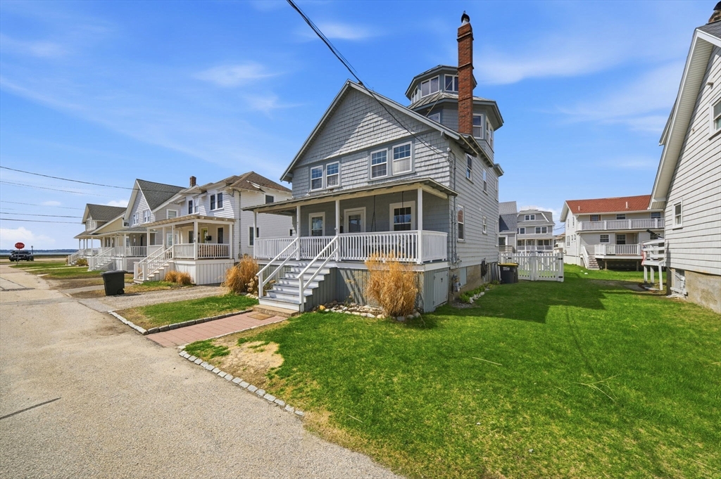 7 Mildred Street Hull, MA 02045 - Photo 32 of 42 a front view of a house with a yard