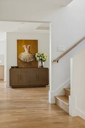 a view of entryway with wooden floor