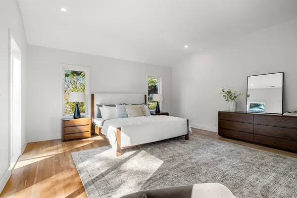 a bed room with furniture and a window