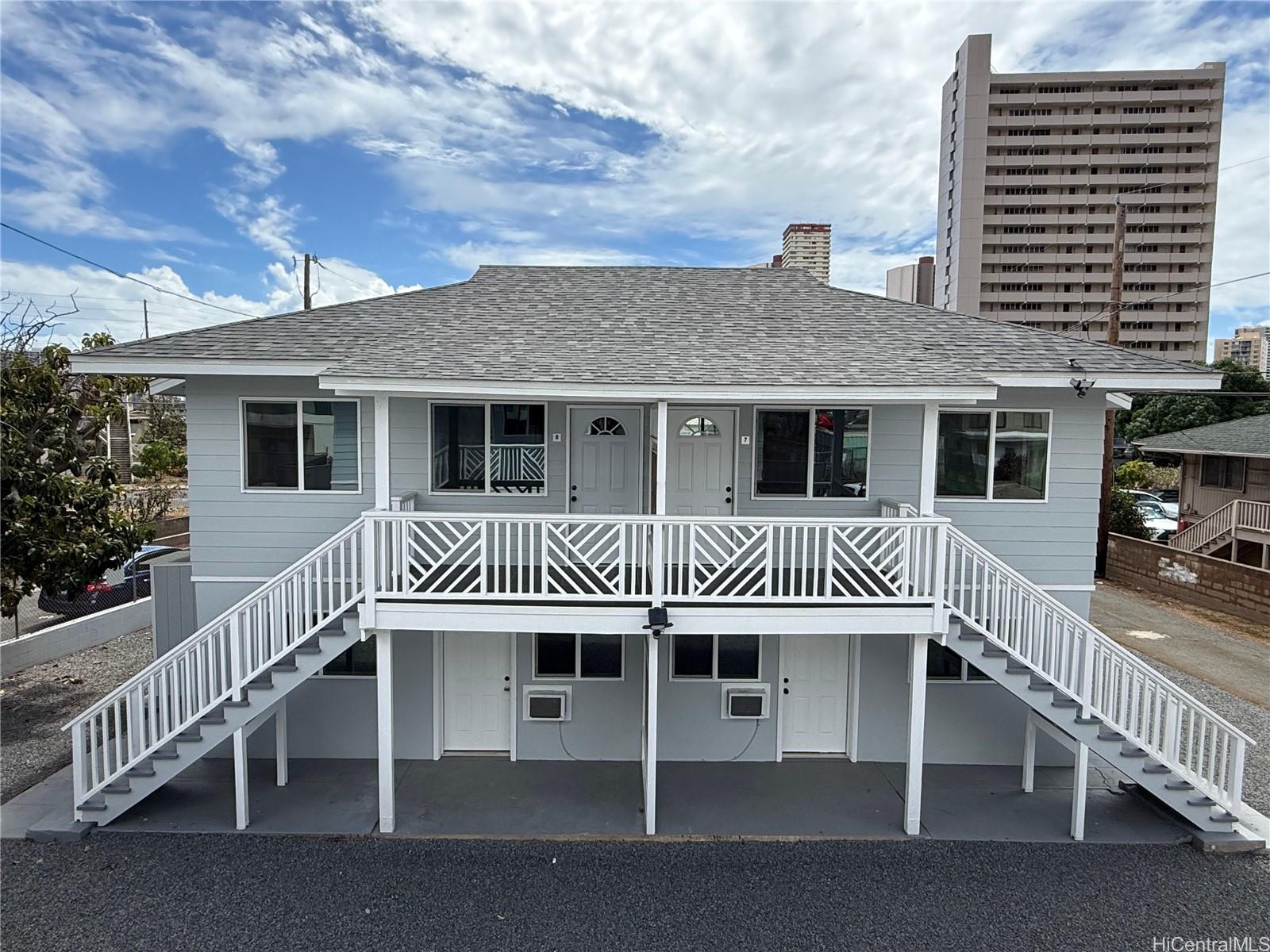 a front view of a house with a balcony