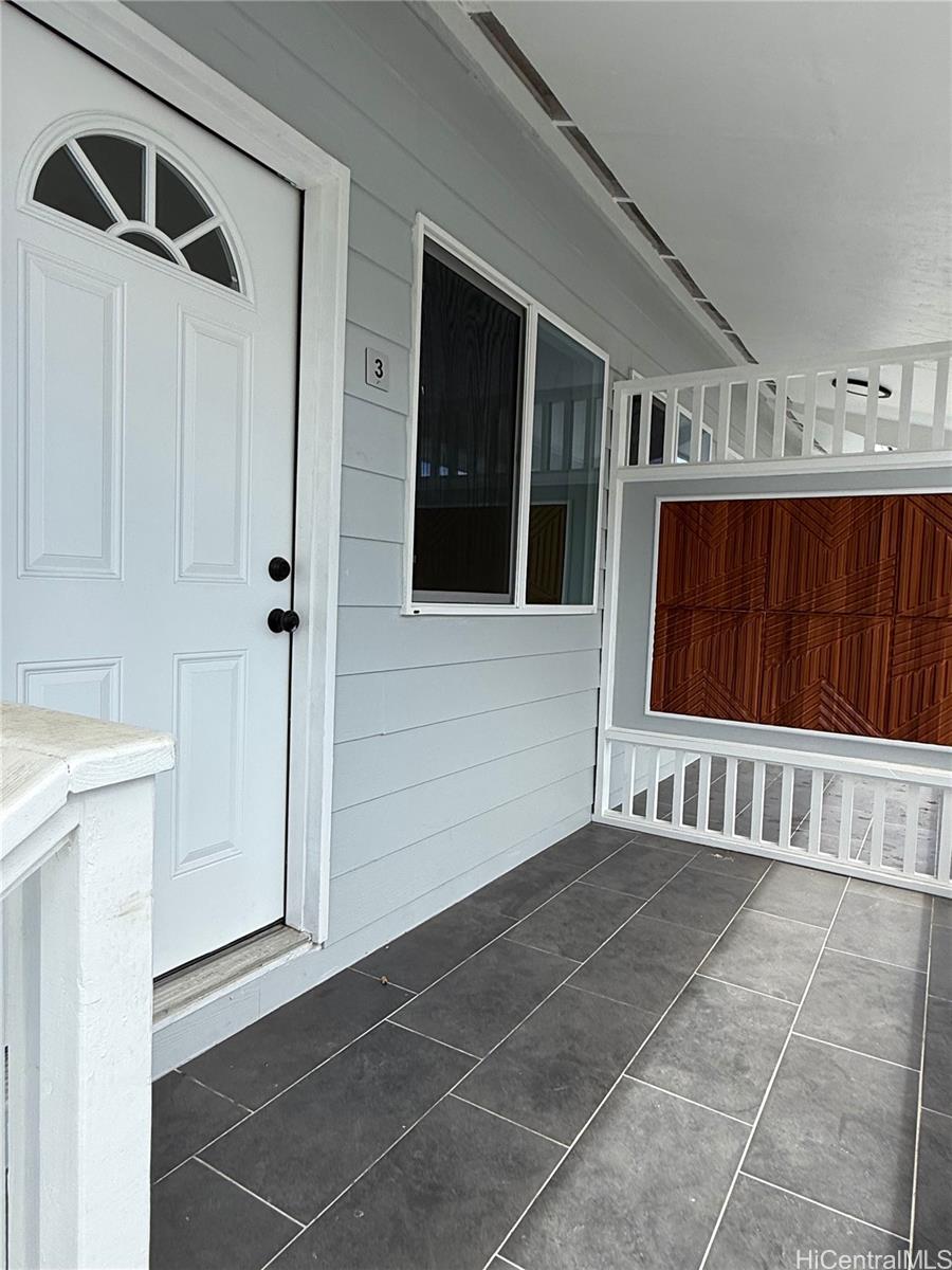 2711 Waiaka Road Honolulu, HI 96826 - Photo 18 of 19 a view of a door and a window