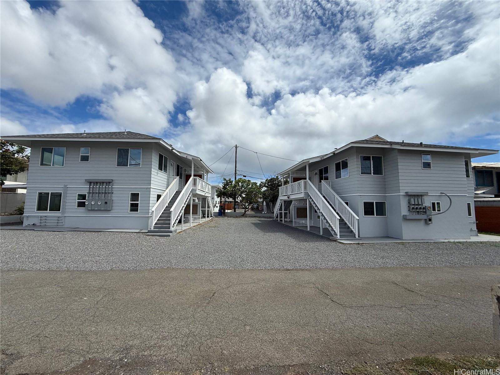 2711 Waiaka Road Honolulu, HI 96826 - Photo 4 of 19 a view of a house with a patio