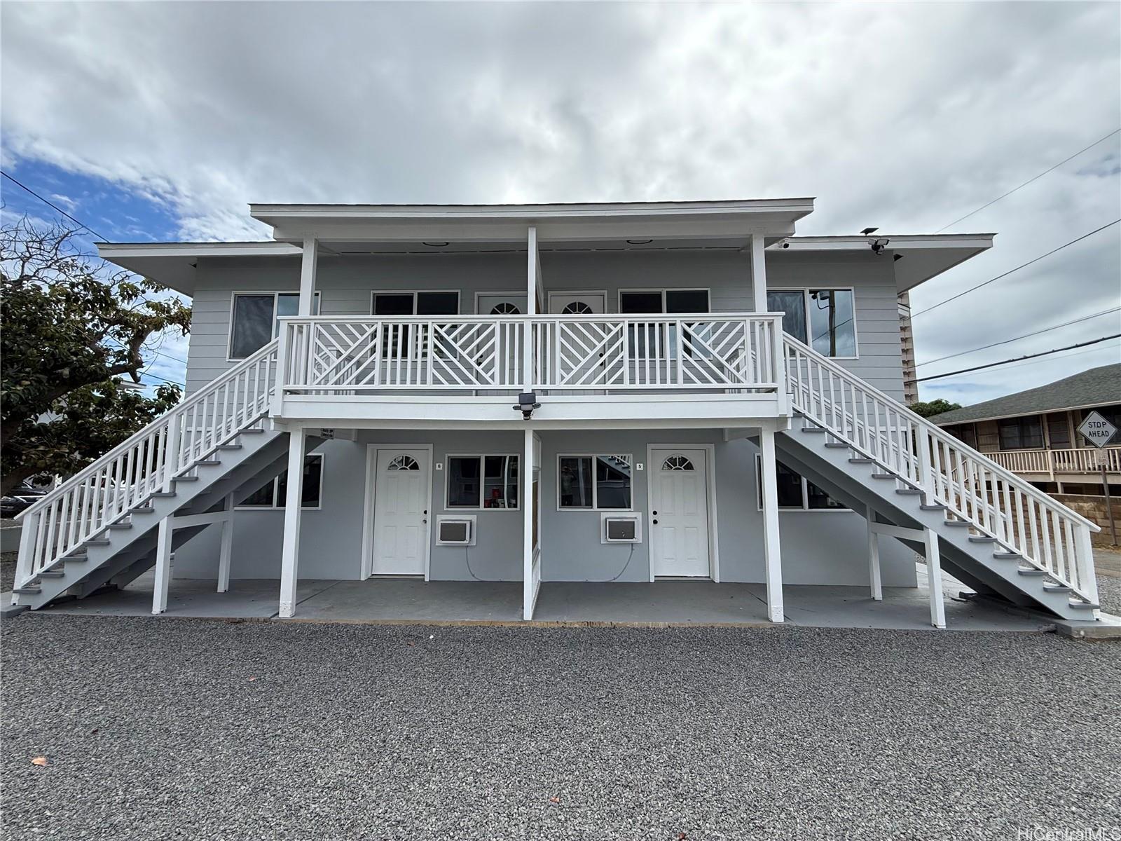2711 Waiaka Road Honolulu, HI 96826 - Photo 7 of 19 a front view of a house with stairs