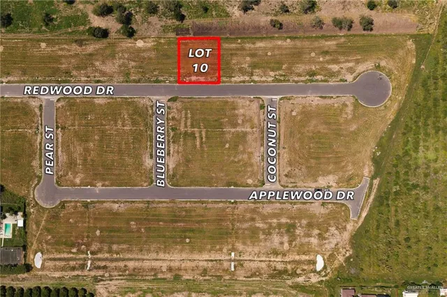 a sign that is on a brick wall