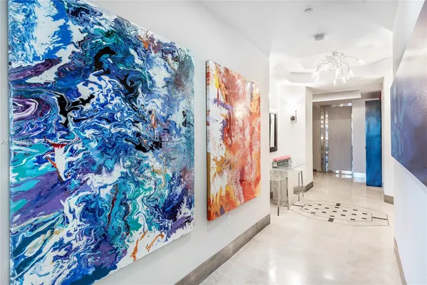 a view of a hallway with beautiful flowers