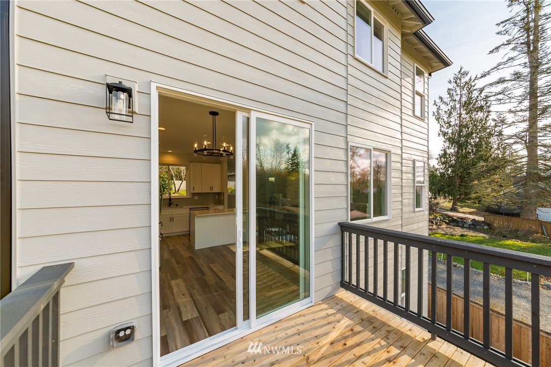 2716 Callow Road, Unit A Lake Stevens, WA 98258 - Photo 13 of 34 a view of a balcony with a potted plant