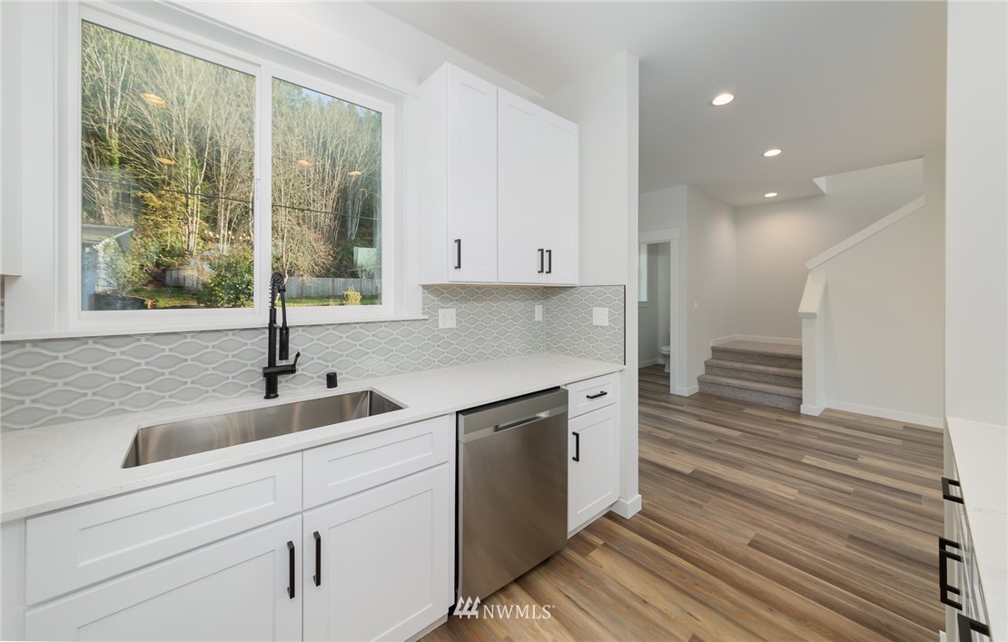 2716 Callow Road, Unit A Lake Stevens, WA 98258 - Photo 18 of 34 a kitchen with a sink and cabinets