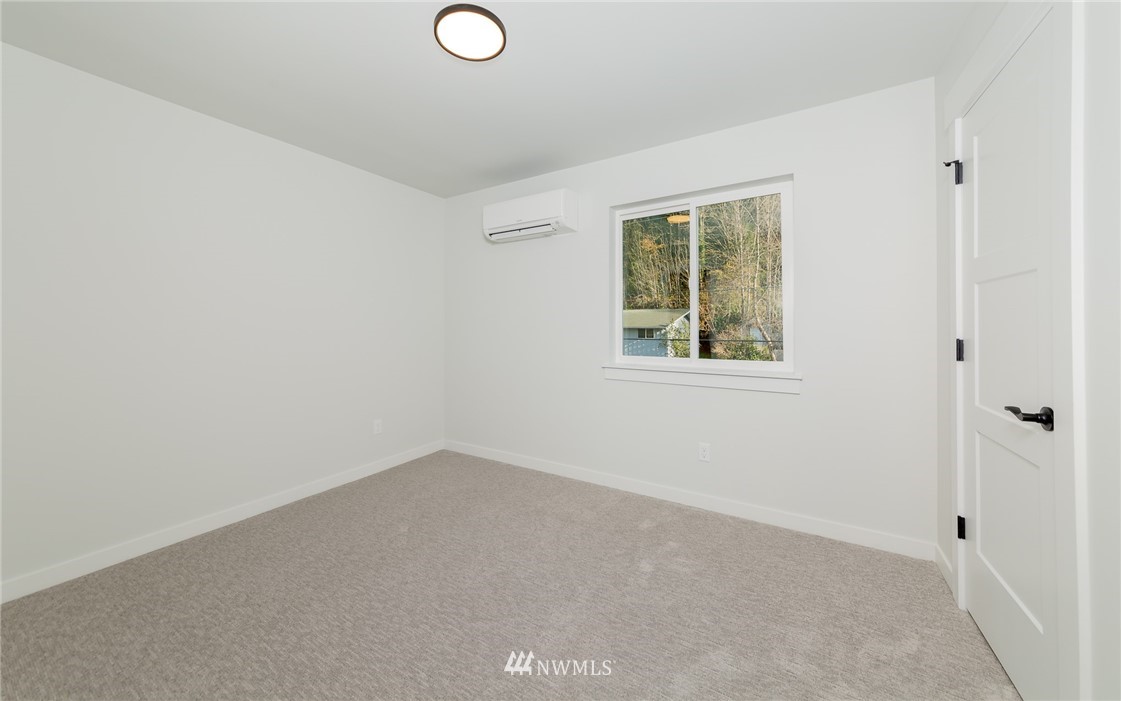 2716 Callow Road, Unit A Lake Stevens, WA 98258 - Photo 22 of 34 an empty room with windows
