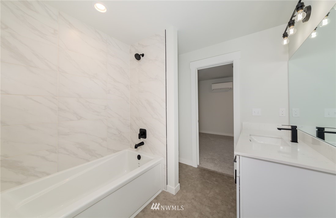 2716 Callow Road, Unit A Lake Stevens, WA 98258 - Photo 25 of 34 a bathroom with a bathtub and a sink