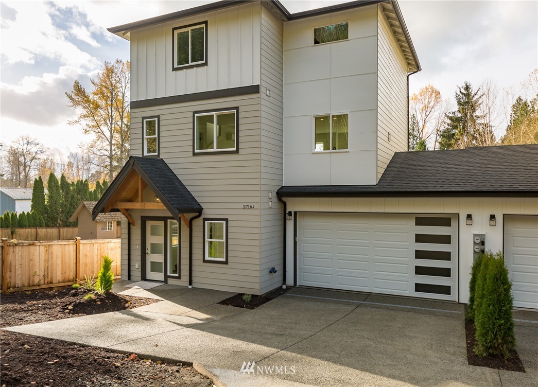 2716 Callow Road, Unit A Lake Stevens, WA 98258 - Photo 30 of 34 a front view of a house with a garage