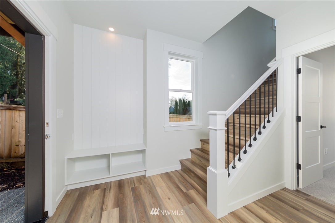 2716 Callow Road, Unit A Lake Stevens, WA 98258 - Photo 4 of 34 a view of entryway with wooden floor and stairs