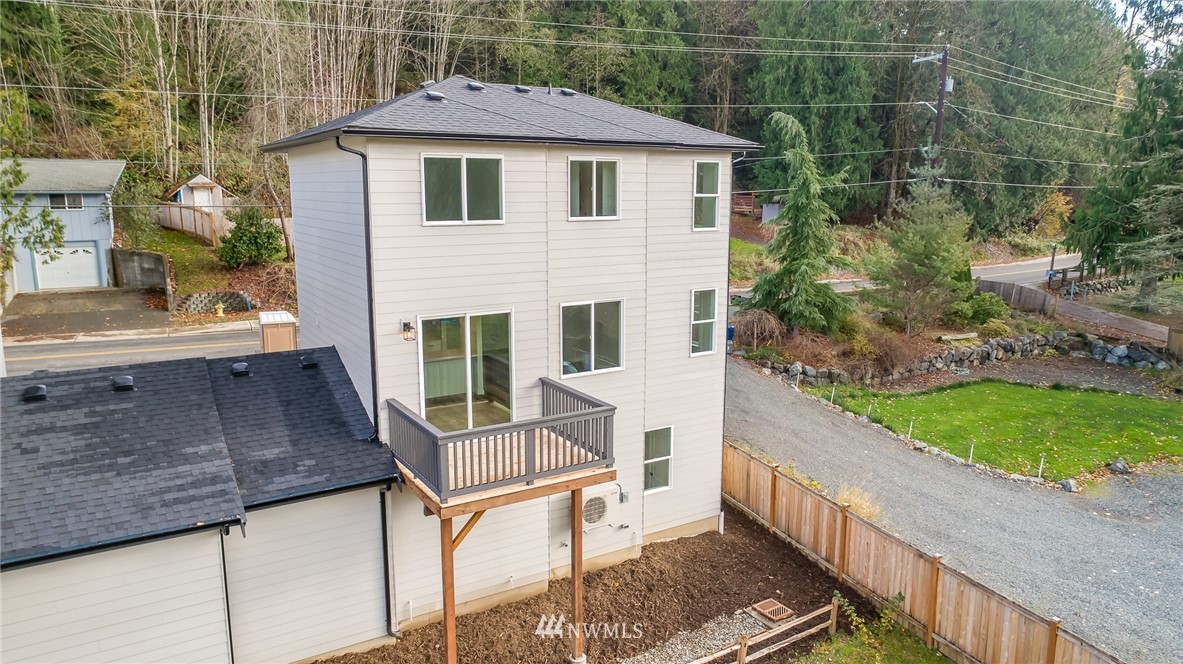 2716 Callow Road, Unit A Lake Stevens, WA 98258 - Photo 31 of 34 a front view of a house with garden