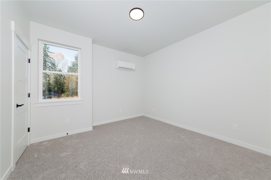 2716 Callow Road, Unit A Lake Stevens, WA 98258 - Photo 5 of 34 an empty room with a window