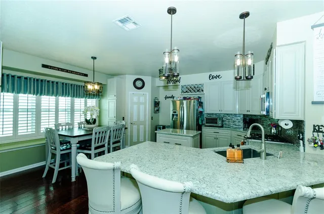 a view of a living room and dining room