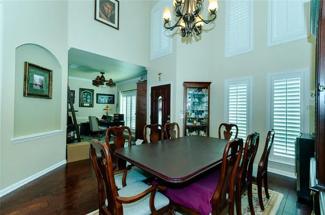 a view of a livingroom with furniture and a window