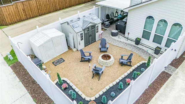 a balcony with table and chairs