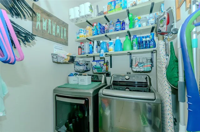 a view of a chairs and table in the balcony