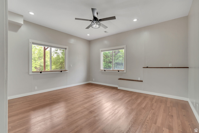 2154 Wasatch Boulevard Sandy, UT 84092 - Photo 42 of 55 Unfurnished room with light wood finished floors, recessed lighting, and ceiling fan
