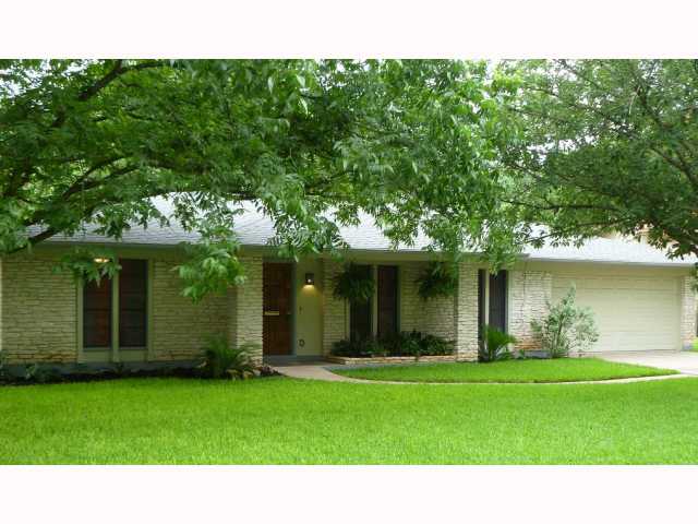 a black and white photo of a house