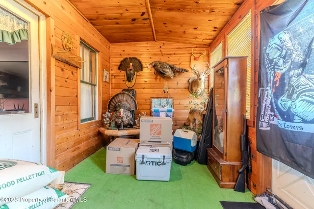 a view of a door and a window