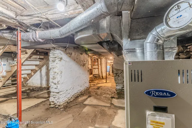 a view of backyard with a balcony and wooden floor