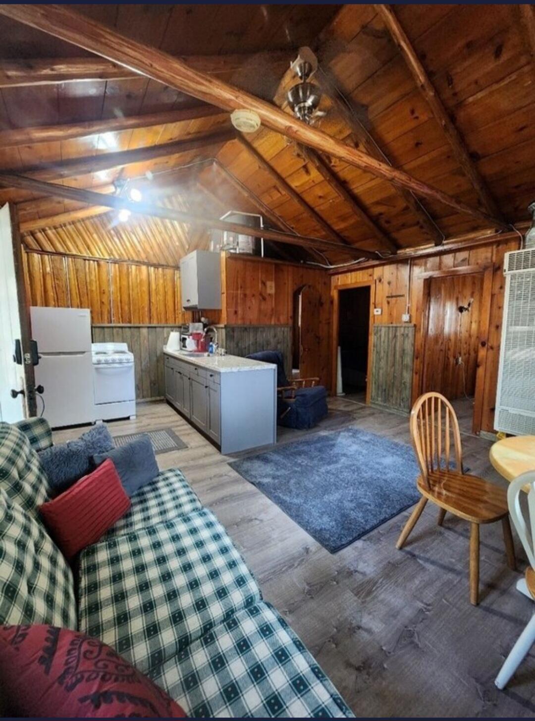 973 North Huron Road East Tawas, MI 48730 - Photo 4 of 8 Kitchenliving room