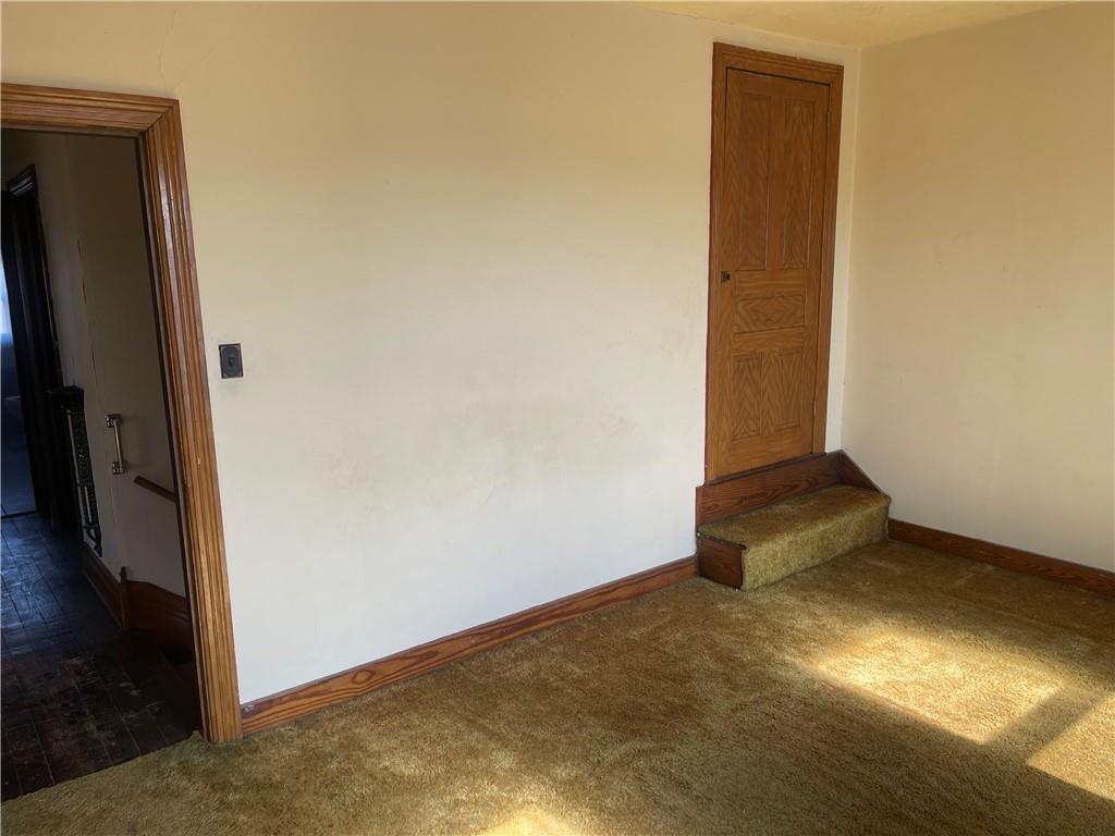 943 Newell Road Fayette City, PA 15438 - Photo 12 of 27 an empty room with an empty room