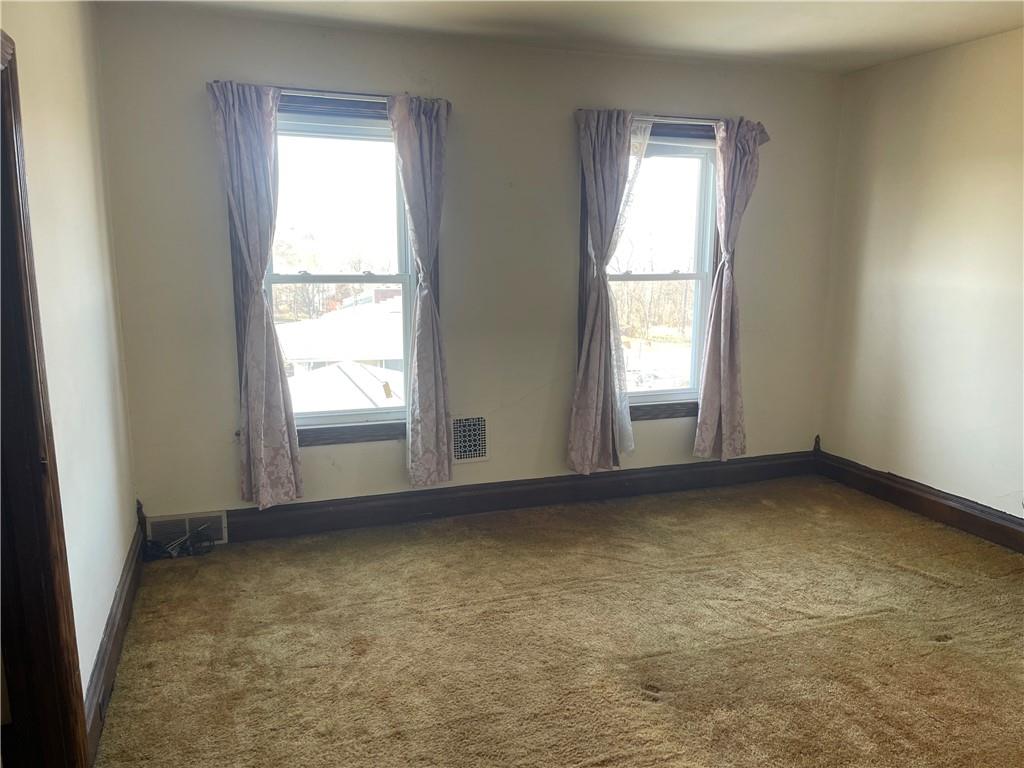 943 Newell Road Fayette City, PA 15438 - Photo 19 of 27 a view of an empty room with a window