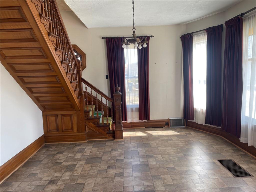943 Newell Road Fayette City, PA 15438 - Photo 3 of 27 a view of an entryway with staircase