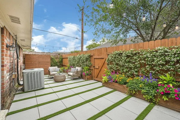 a view of a porch with seating space