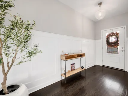 a room with furniture and wooden floor