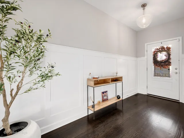 a room with furniture and wooden floor