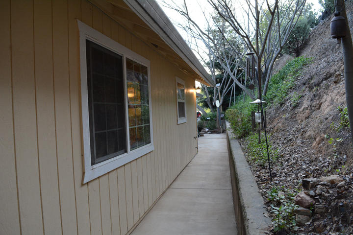 14722 Ravine Road Redding, CA 96003 - Photo 8 of 15 Back of house 1.jpg