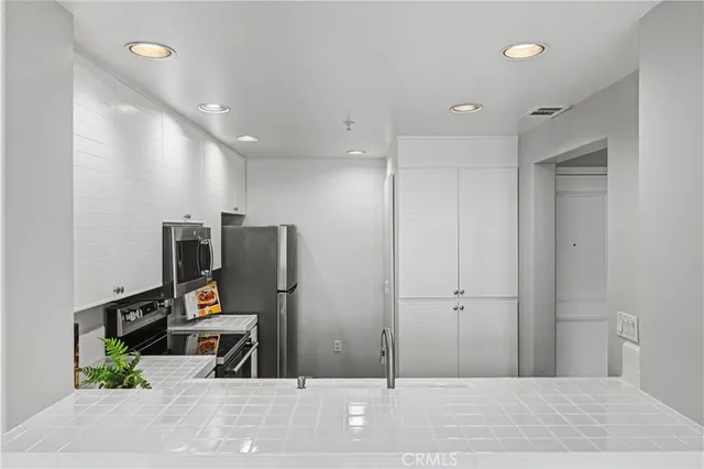 a view of a hallway with a couch