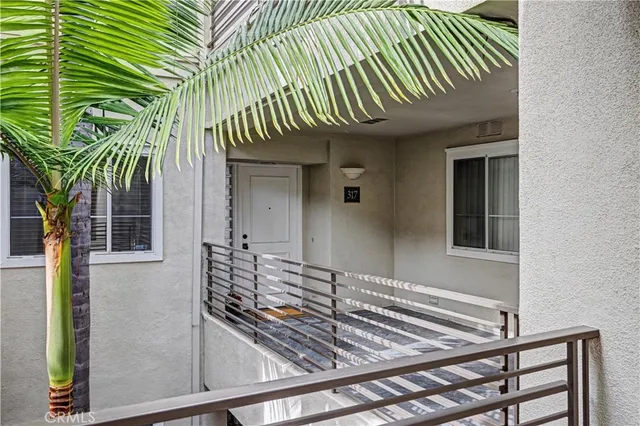 a view of backyard with a deck