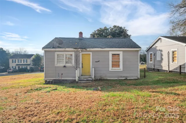 a house view with a garden space