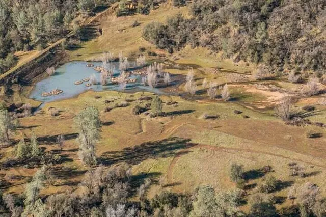 a view of outdoor space with wooden fence