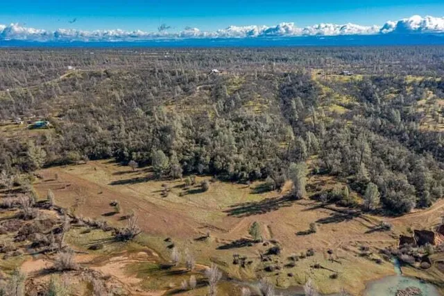 a view of a lake with a beach