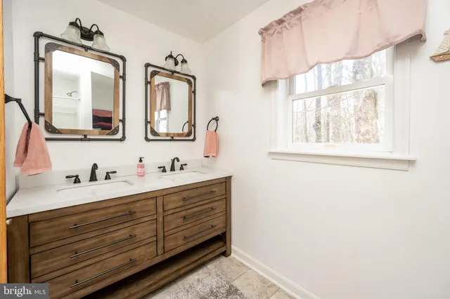 a view of a chairs and table in a patio